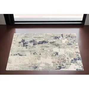 Photo of Blue and Beige Abstract Area Rug