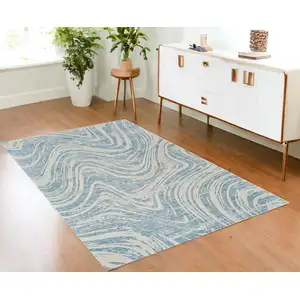 Photo of Blue and Beige Abstract Distressed Area Rug