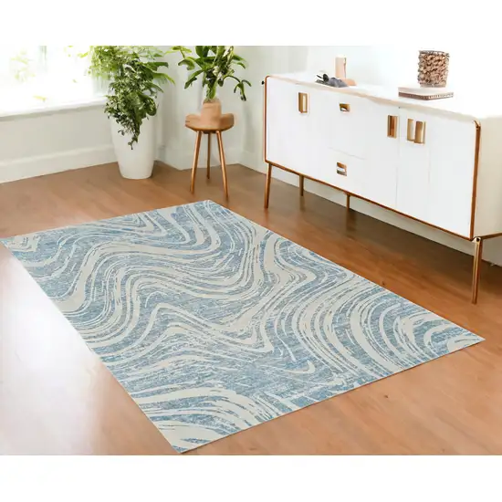 Blue and Beige Abstract Distressed Area Rug Photo 1