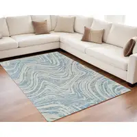 Photo of Blue and Beige Abstract Distressed Area Rug