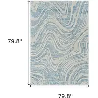 Photo of Blue and Beige Abstract Distressed Area Rug