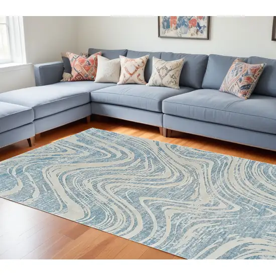 Blue and Beige Abstract Distressed Area Rug Photo 1