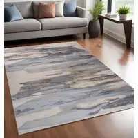 Photo of Blue and Beige Abstract Distressed Area Rug