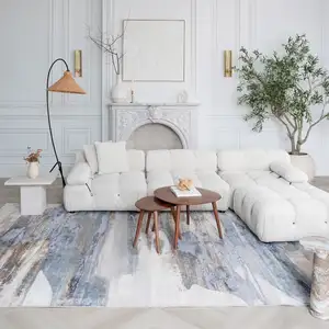 Photo of Blue and Beige Abstract Distressed Area Rug