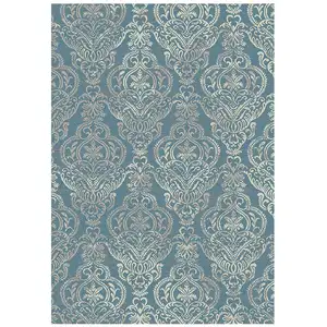 Photo of Blue and Beige Damask Distressed Area Rug