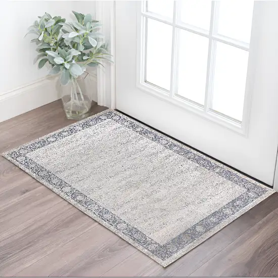 Blue and Beige Floral Area Rug Photo 1