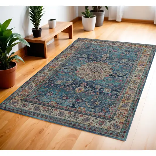 Blue and Beige Floral Distressed Area Rug Photo 1