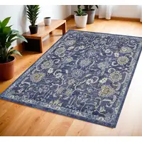 Photo of Blue and Beige Floral Power Loom Area Rug