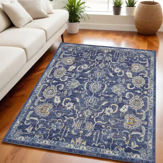 Blue and Beige Floral Power Loom Area Rug Photo 1