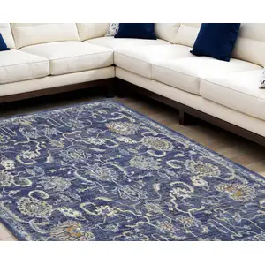 Photo of Blue and Beige Floral Power Loom Area Rug