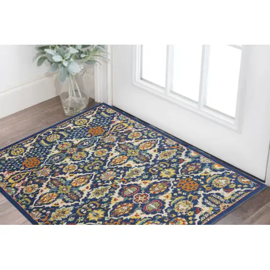 Blue and Beige Floral Power Loom Area Rug Photo 1