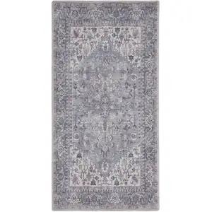 Photo of Blue and Beige Floral Power Loom Distressed Area Rug