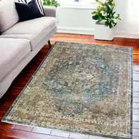 Photo of Blue and Brown Oriental Distressed Area Rug With Fringe