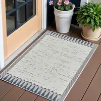 Photo of Blue and Cream Abstract Distressed Indoor Outdoor Area Rug