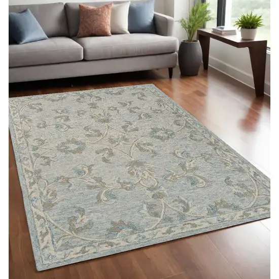 Blue And Ivory Wool Hand Tufted Area Rug Photo 1