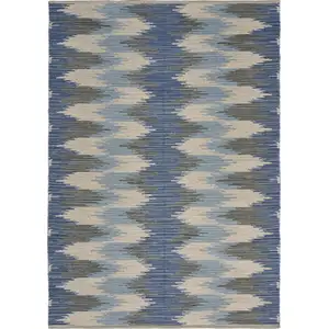 Photo of Blue and Cream Ikat Pattern Area Rug