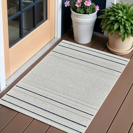 Blue and Cream Striped Distressed Indoor Outdoor Area Rug Photo 1