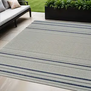 Photo of Blue and Cream Striped Distressed Indoor Outdoor Area Rug