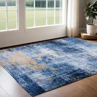 Photo of Blue and Gold Abstract Washable Non Skid Area Rug