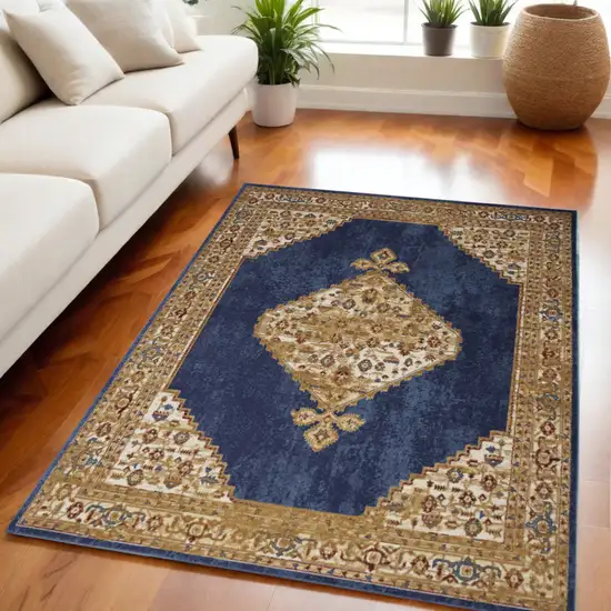 Blue and Gold Medallion Power Loom Distressed Area Rug Photo 1