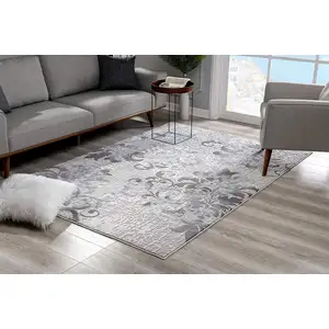 Photo of Blue and Gray Floral Filigree Area Rug