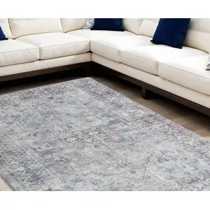 Photo of Blue and Gray Floral Medallion Power Loom Distressed Washable Area Rug