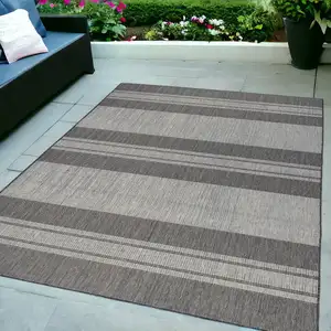 Photo of Blue and Gray Striped Stain Resistant Indoor Outdoor Area Rug