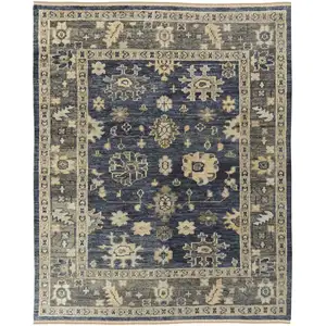 Photo of Blue and Gray Wool Floral Hand Knotted Area Rug With Fringe