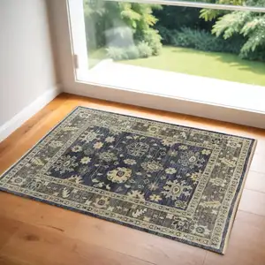 Photo of Blue and Gray Wool Floral Hand Knotted Area Rug With Fringe