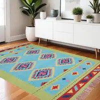 Photo of Blue and Green Southwestern Handmade Area Rug With Fringe