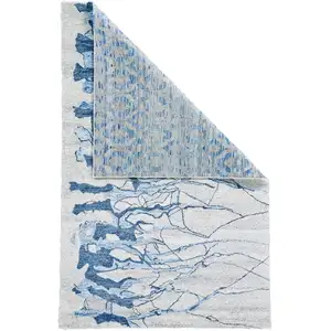 Photo of Blue and Ivory Abstract Hand Tufted Area Rug