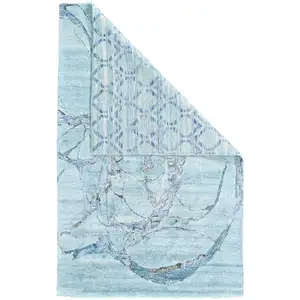 Photo of Blue and Ivory Abstract Hand Tufted Area Rug