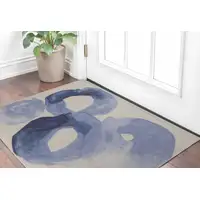 Photo of Blue and Ivory Abstract Hand Tufted Area Rug