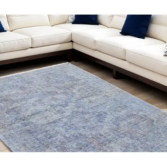 Blue and Ivory Abstract Hand Woven Distressed Area Rug With Fringe Photo 1