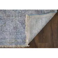 Photo of Blue and Ivory Abstract Hand Woven Distressed Area Rug With Fringe