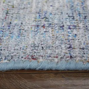 Photo of Blue and Ivory Abstract Hand Woven Distressed Area Rug With Fringe