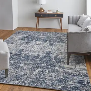 Photo of Blue and Ivory Abstract Hand Woven Worn Faded Area Rug