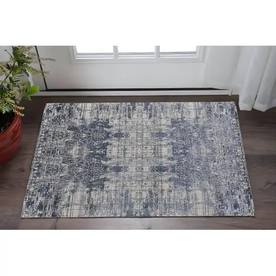 Blue and Ivory Abstract Hand Woven Worn Faded Area Rug Photo 1