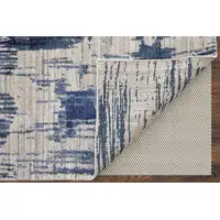 Photo of Blue and Ivory Abstract Hand Woven Worn Faded Area Rug