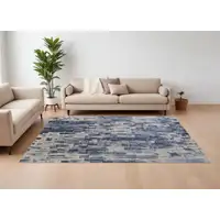 Photo of Blue and Ivory Abstract Hand Woven Worn Faded Area Rug