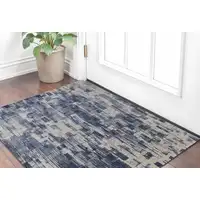 Photo of Blue and Ivory Abstract Hand Woven Worn Faded Area Rug