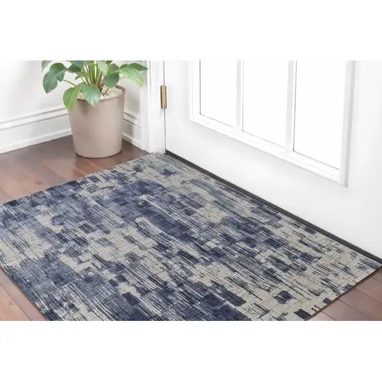 Blue and Ivory Abstract Hand Woven Worn Faded Area Rug Photo 1