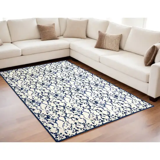 Blue and Ivory Abstract Power Loom Area Rug Photo 1