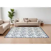 Photo of Blue and Ivory Abstract Power Loom Area Rug