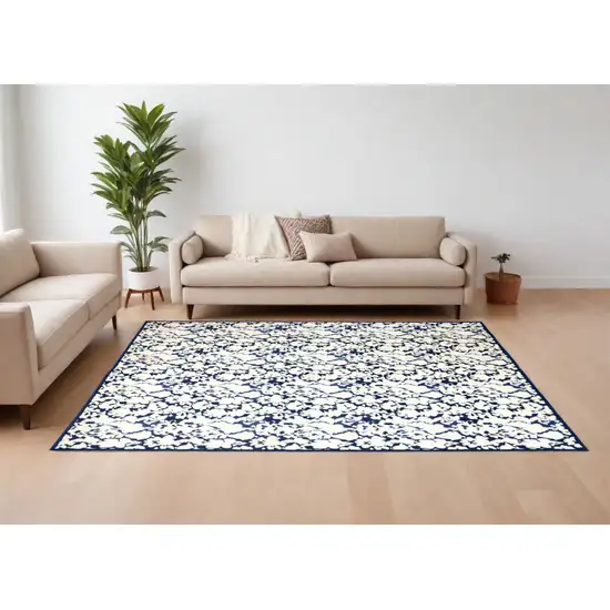 Blue and Ivory Abstract Power Loom Area Rug Photo 1