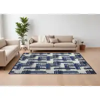 Photo of Blue and Ivory Abstract Power Loom Area Rug