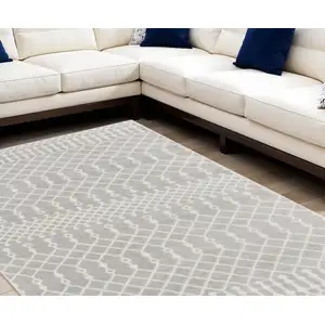 Photo of Blue and Ivory Abstract Power Loom Washable Area Rug