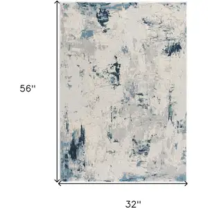 Photo of Blue and Ivory Abstract Strokes Area Rug