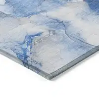 Photo of Blue and Ivory Abstract Washable Non Skid Indoor Outdoor Area Rug