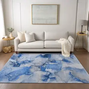 Photo of Blue and Ivory Abstract Washable Non Skid Indoor Outdoor Area Rug